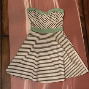 Strapless black and white striped dress.